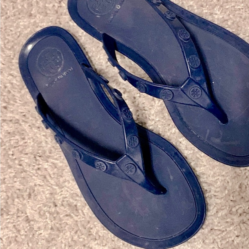 Tory Burch flip flops.  Gently used